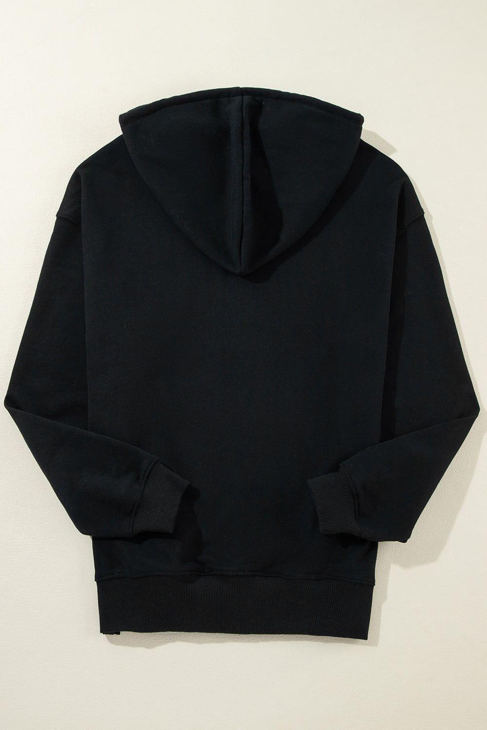 Cozy black fleece-lined hoodie with kangaroo pocket and drawstring design