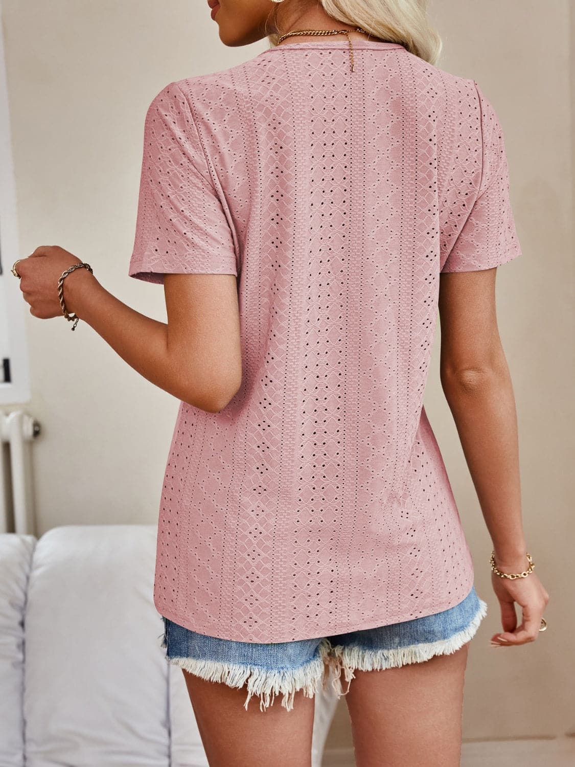 Eyelet V-Neck Short Sleeve Top.