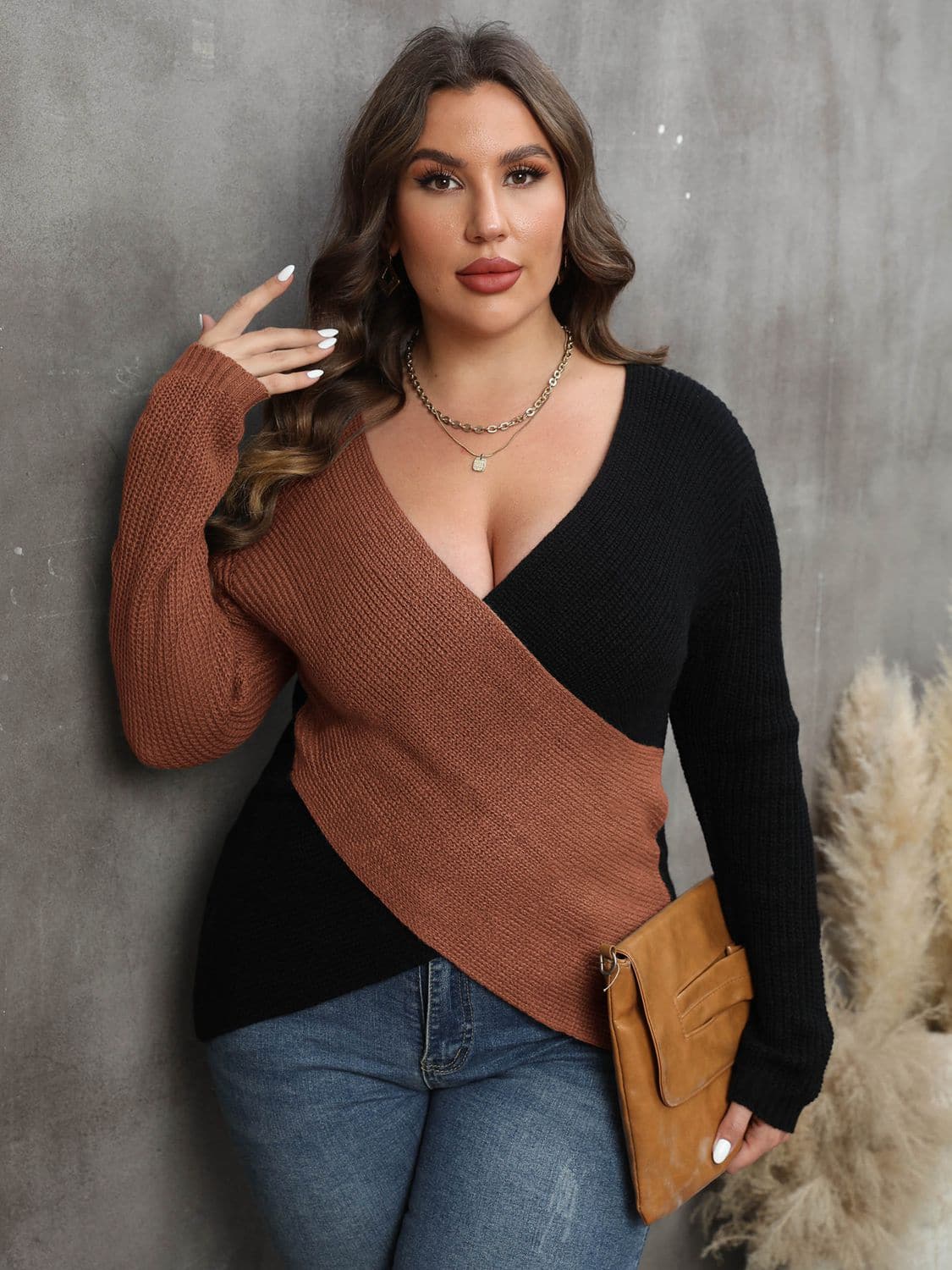 Plus Size Two-Tone Surplice Neck Sweater.