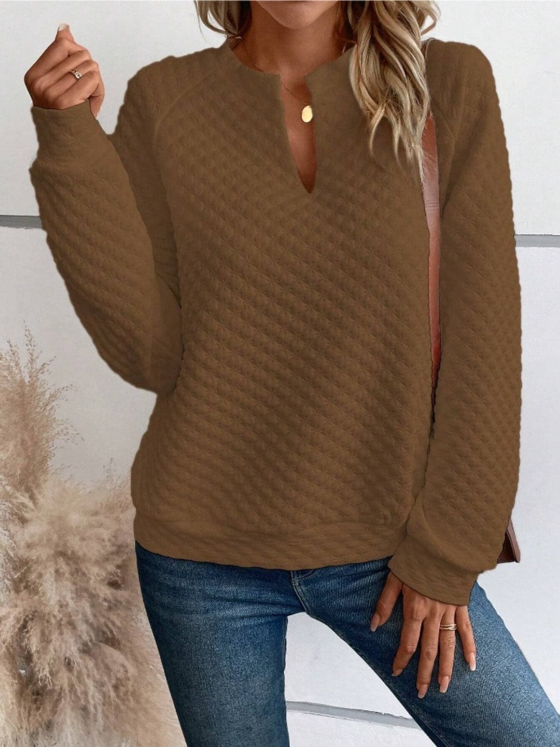 Notched Long Sleeve Sweatshirt.