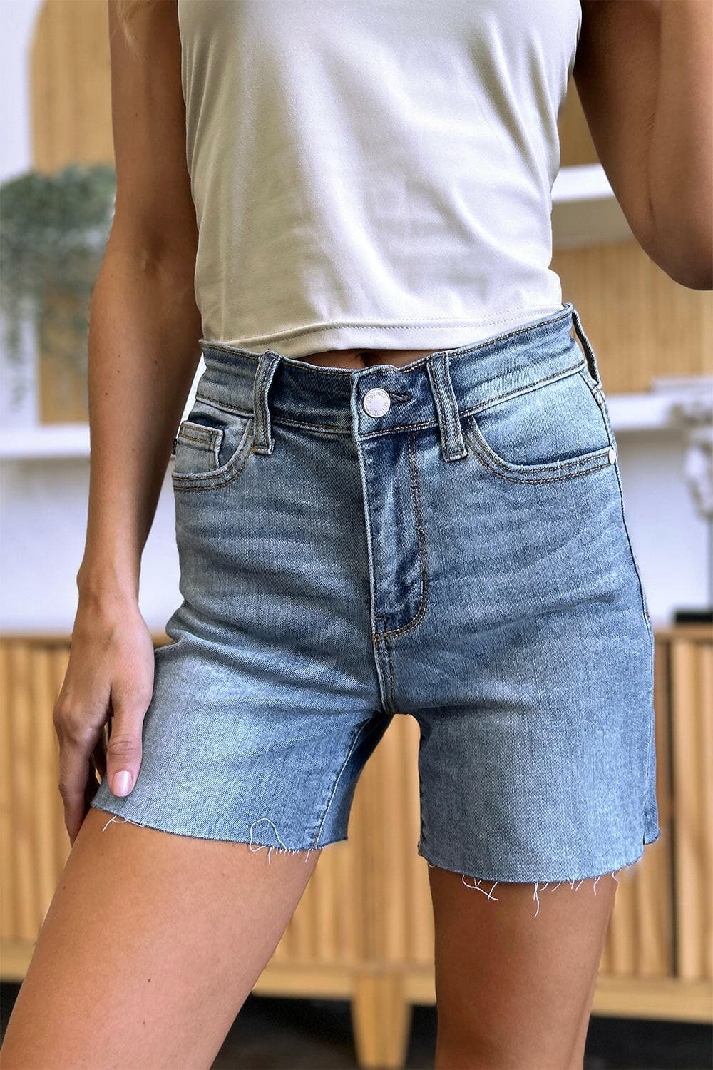 Judy Blue Full Size High Waist Raw Hem Denim Shorts.