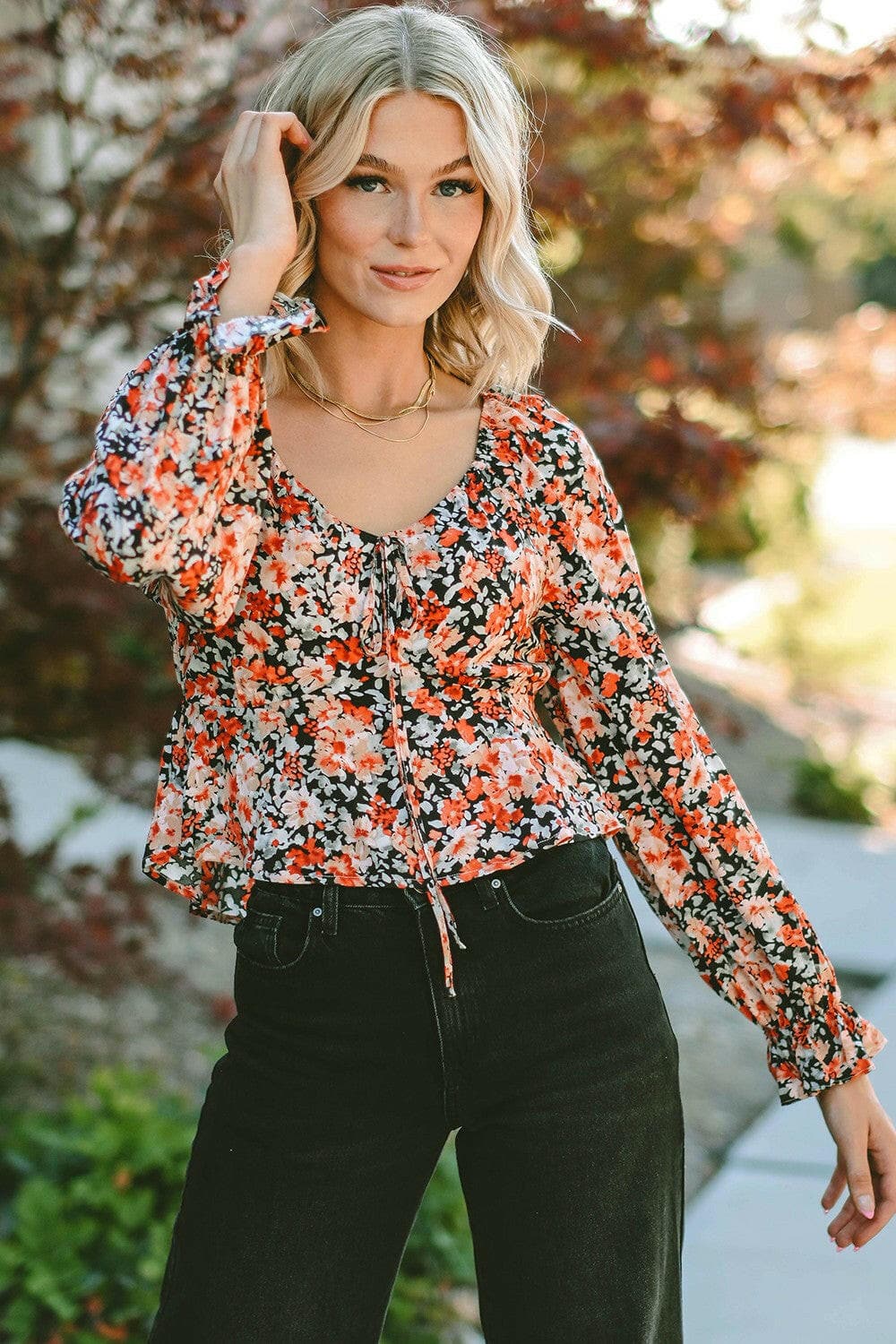 Floral Tied Flounce Sleeve Peplum Blouse.