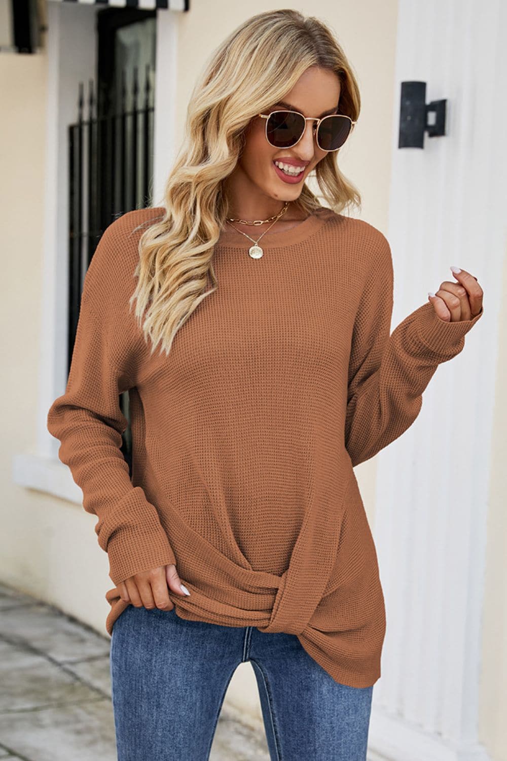 Twisted Round Neck Sweater.