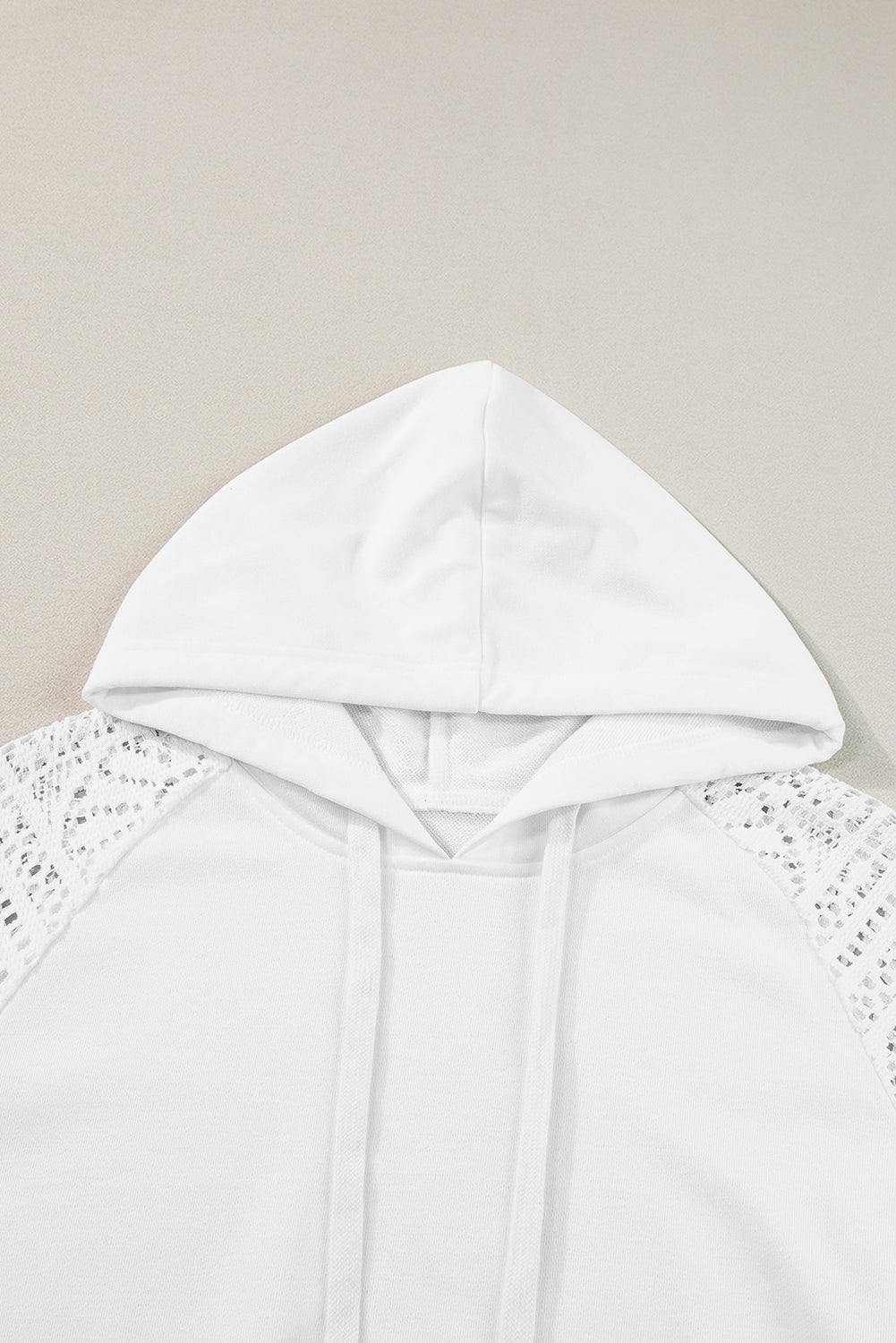 Elegant white lace sleeve hoodie with drawstring and cozy hood