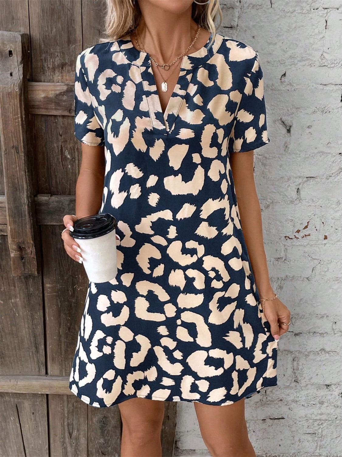 Printed Notched Short Sleeve Mini Dress.