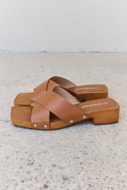 Weeboo Step Into Summer Criss Cross Wooden Clog Mule in Brown.