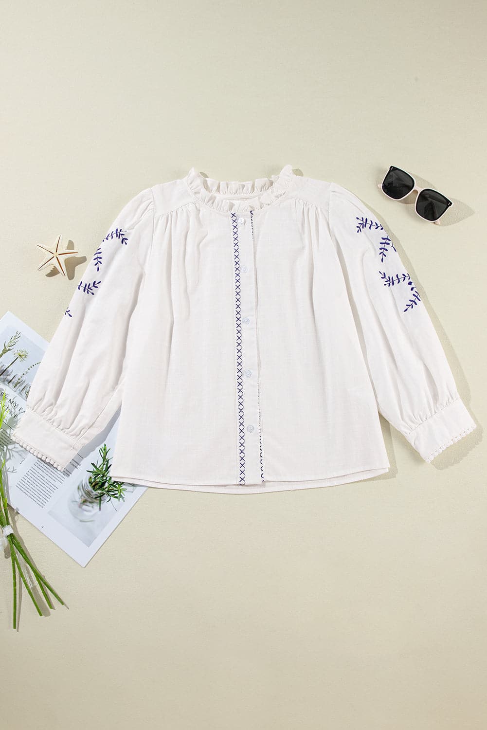 Embroidered Round Neck Long Sleeve Blouse.