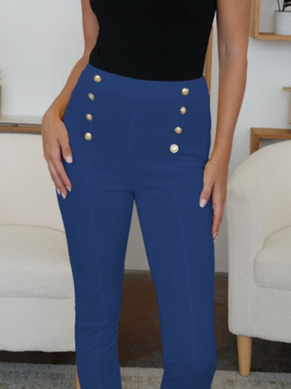 Stylish high-waisted skinny trousers with decorative buttons