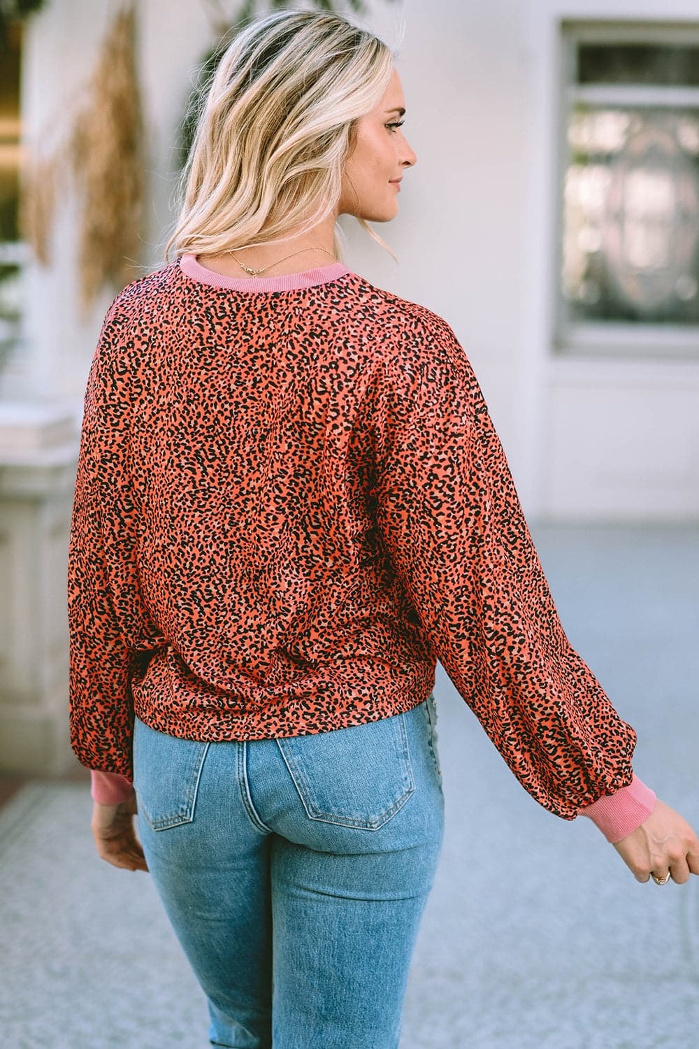 Leopard Round Neck Long Sleeve Sweatshirt.