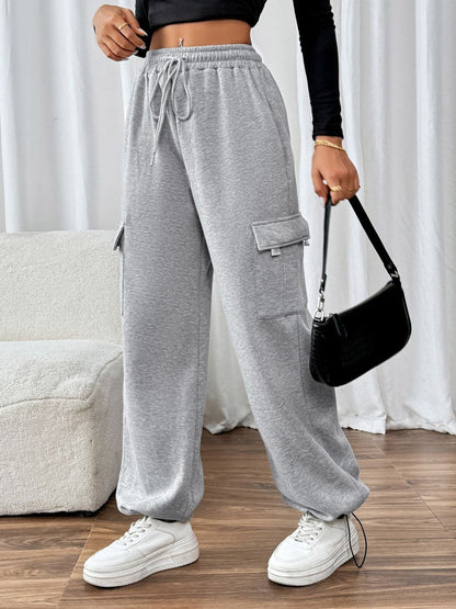 Perfee Drawstring Elastic Waist Joggers with PocketsFeatures: Drawstring, Pocketed
Sheer: Opaque
Material composition: 85% polyester, 15% cotton
Care instructions: Machine wash cold. Tumble dry low.
Imported


Size
USLove Salve Perfee Drawstring Elastic Waist JoggersPants