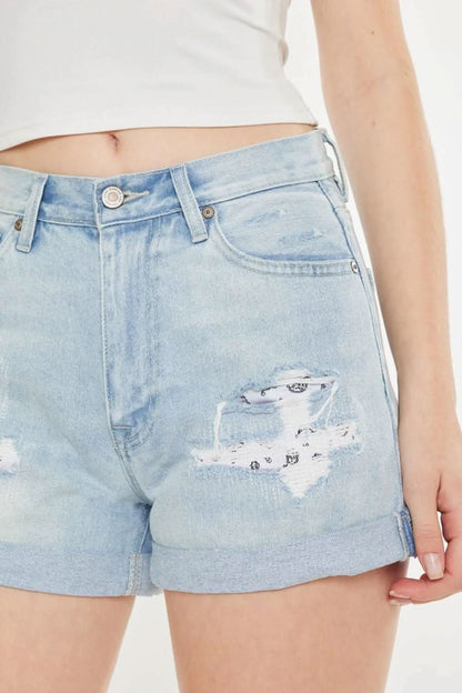 Vintage-inspired high rise repaired mom denim shorts