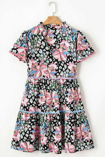 Floral flared plus size dress with playful ric-rac trim and ruffle sleeves