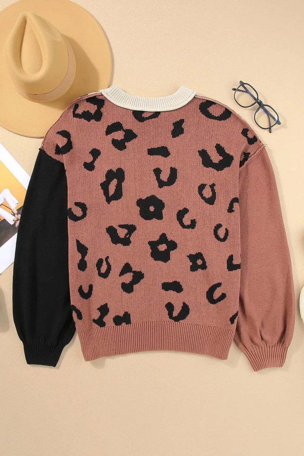 Leopard Round Neck Long Sleeve SweaterFeatures: Exposed seam
Stretch: Slightly stretchy
Material composition: 55% acrylic, 45% cotton
Care instructions: Machine wash cold. Tumble dry low.
Imported


SizeLove Salve Leopard Round Neck Long Sleeve SweaterKnit Tops