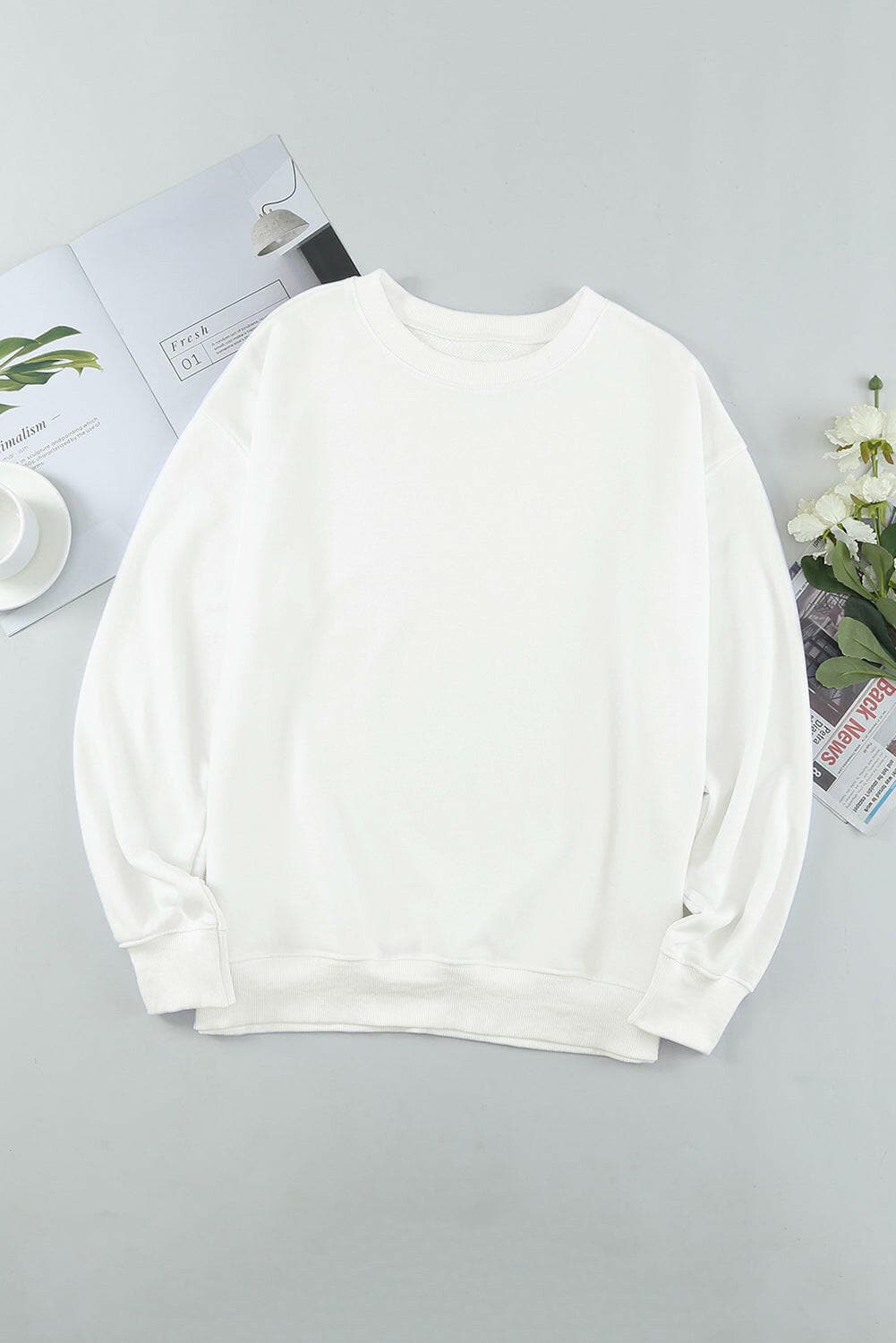 Round Neck Dropped Shoulder Sweatshirt.