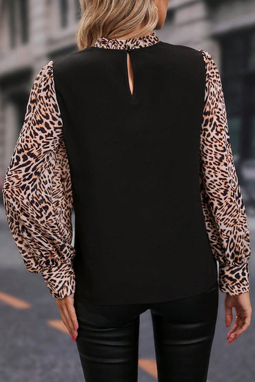 Elegant black lantern sleeve blouse with leopard print accents