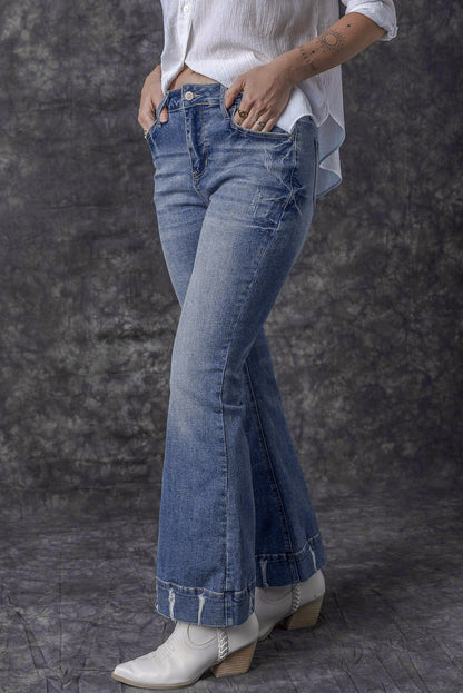 Light blue distressed flare jeans