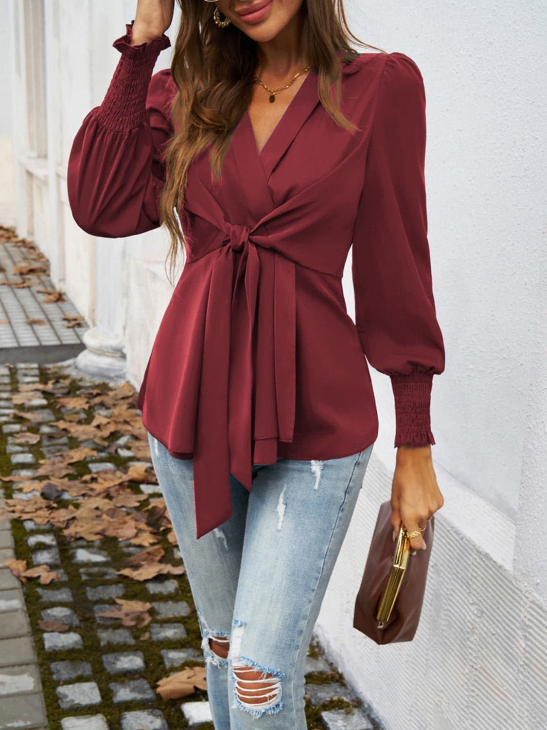 Smocked Surplice Long Sleeve Blouse.