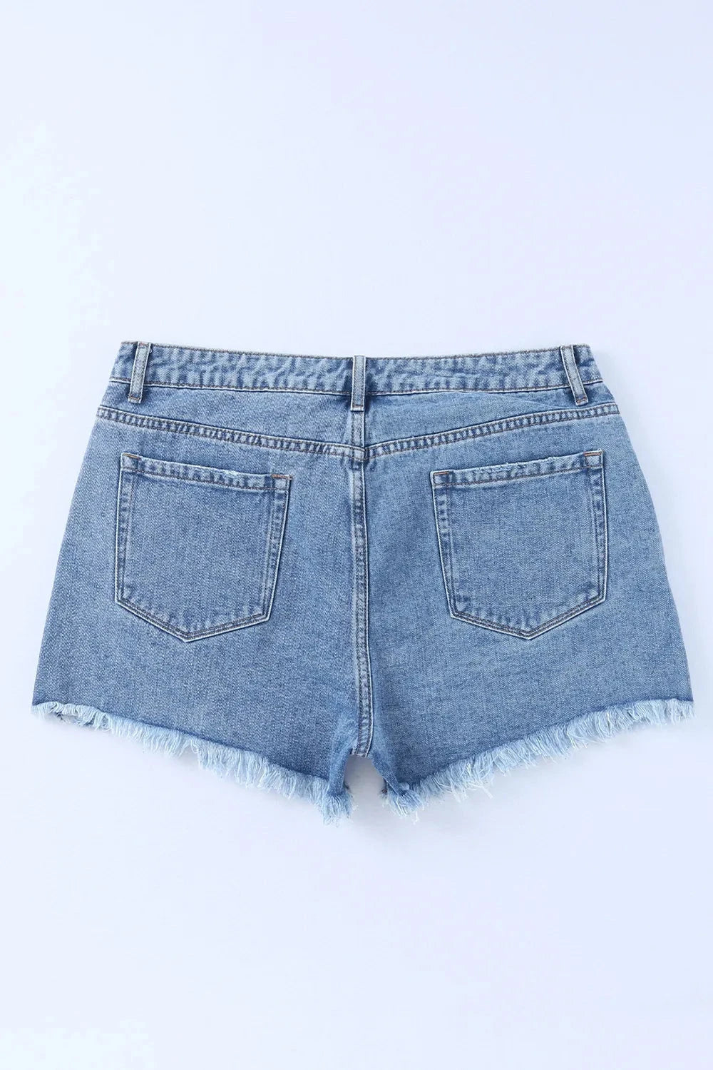 Crossover Cutie High Rise Distressed Denim Shorts Coco’s Tee Boutique