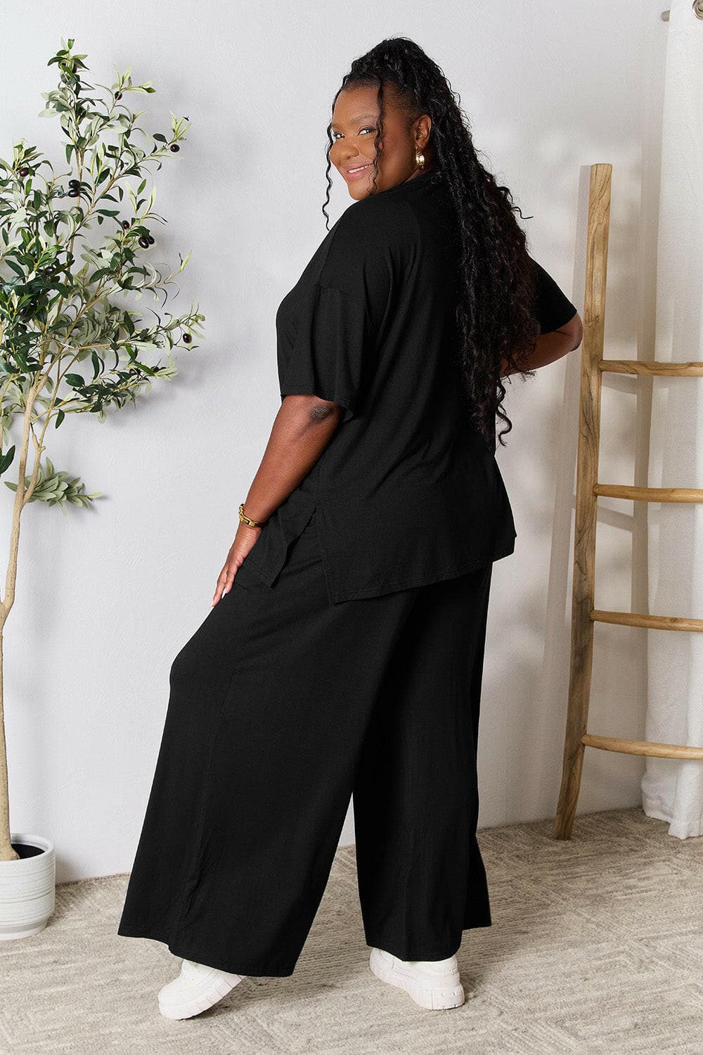 Double Take Full Size Round Neck Slit Top and Pants SetUpgrade Your Style with the Double Take Set
 Step into sophistication with our Double Take Full Size Round Neck Slit Top and Pants Set. This chic and versatile two-pLove Salve Full Size Round Neck Slit Topusa