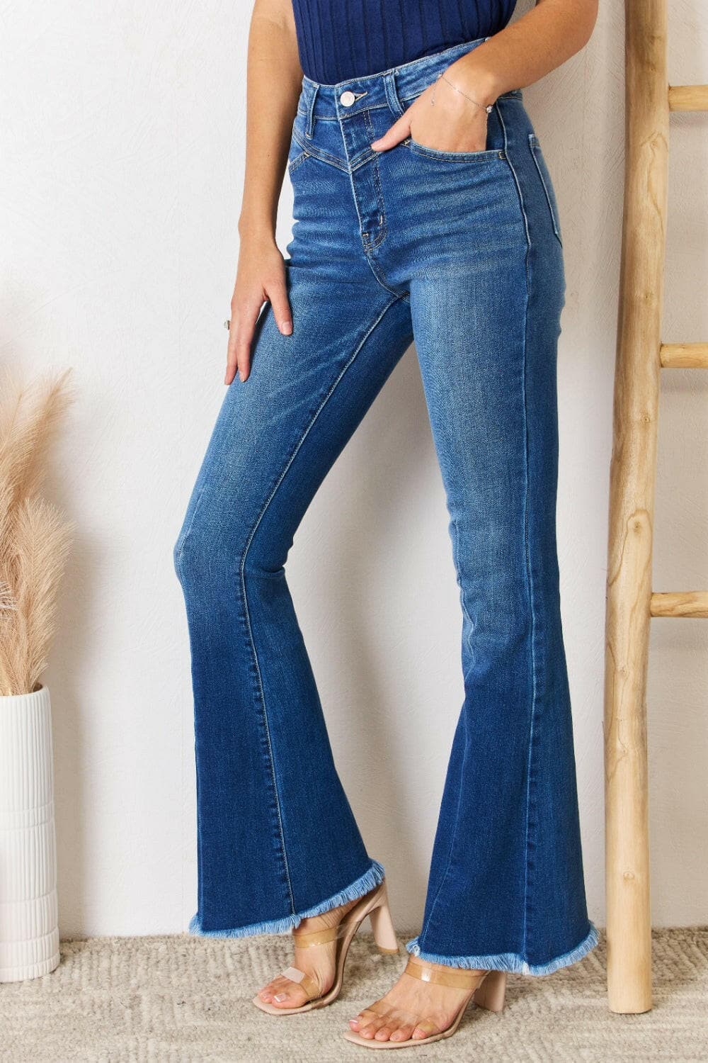 Kancan High Rise Raw Hem Flare Jeans.