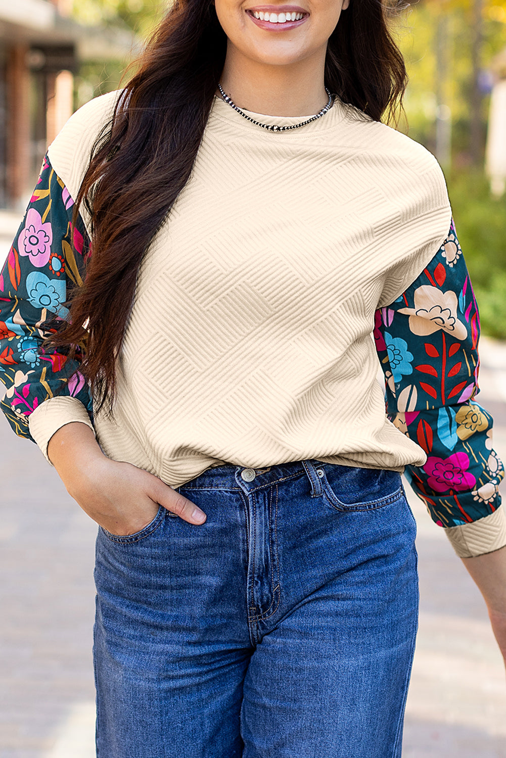 White floral sleeve knit top