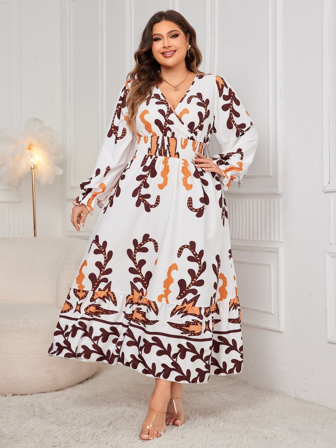 Plus Size Printed Surplice Flounce Sleeve Dress.