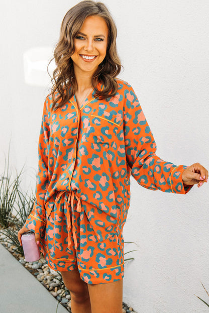 Leopard print loungewear set with long sleeves and shorts in vibrant orange