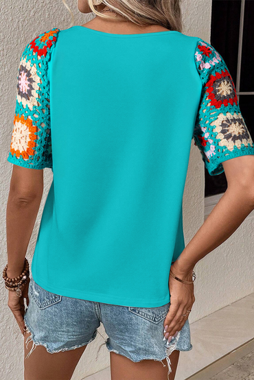 Chic turquoise floral crochet top with short sleeves