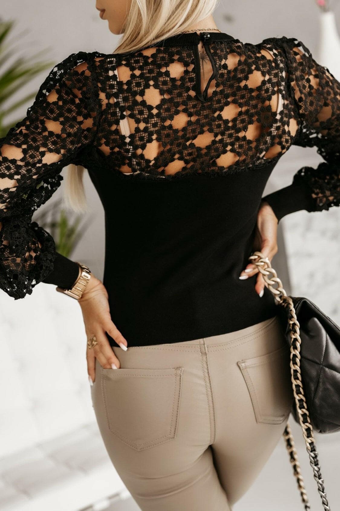 Hollowed Floral Lace Spliced Long Sleeve Blouse.