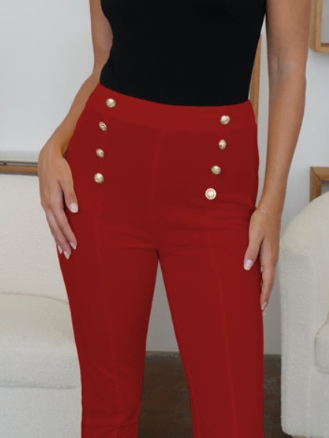 Stylish high-waisted skinny trousers with decorative buttons