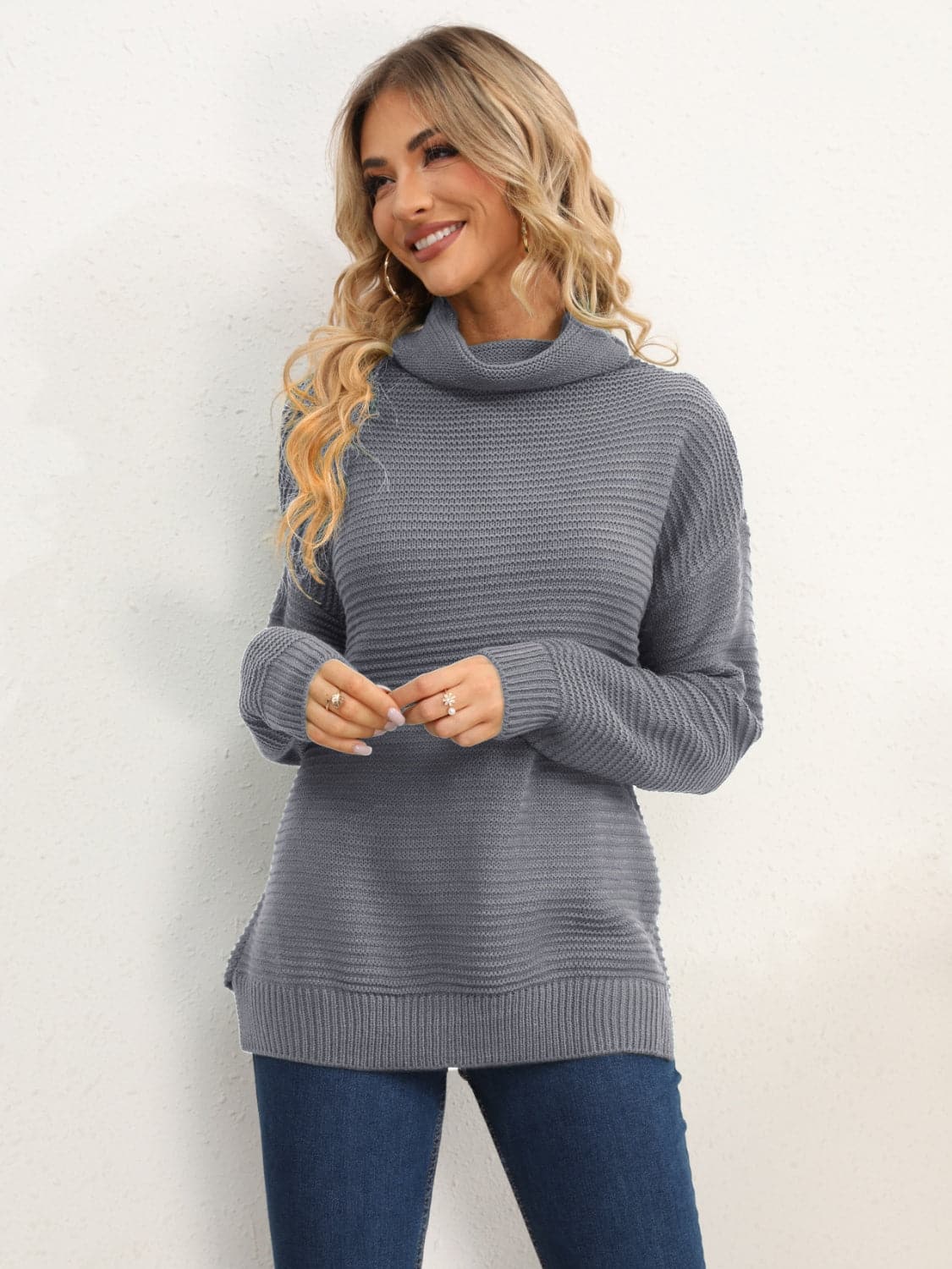 Slit Turtleneck Dropped Shoulder Sweater.