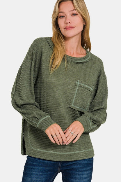 Exposed seam long sleeve top