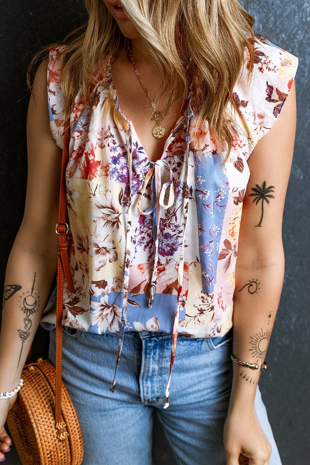 Printed Tie Neck Cap Sleeve Blouse.