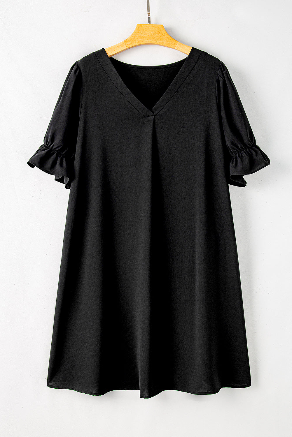 Elegant black ruffled mini dress with puff sleeves for plus sizes