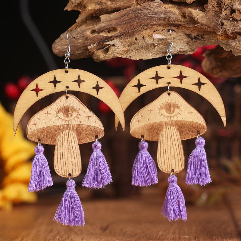 Celestial charm dangle earrings with tassel accents