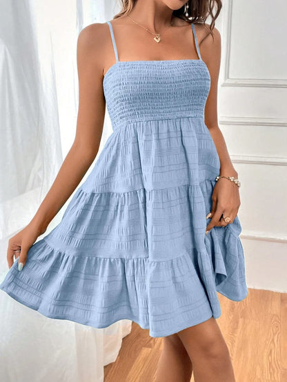 Smocked Tiered Sleeveless Mini Dress.