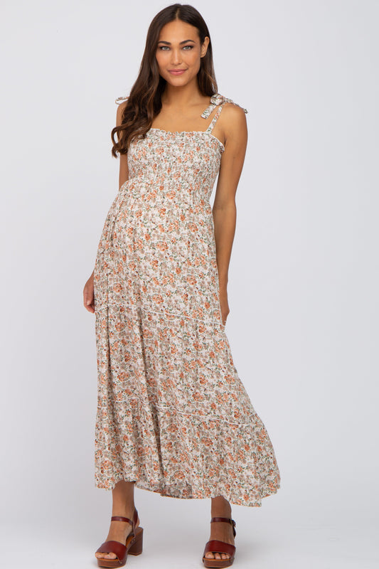 PinkBlush Beige Floral Sleeveless Tiered Maternity Maxi Dress, full length, flowing tiered skirt, delicate floral pattern.