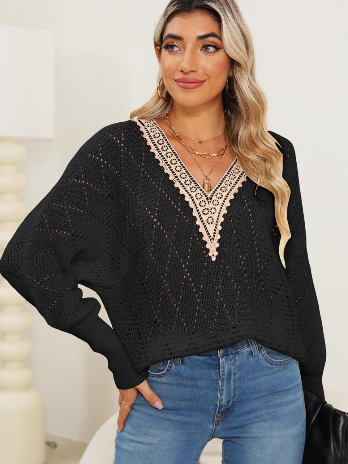 Lace-accented v-neck long sleeve knit sweater