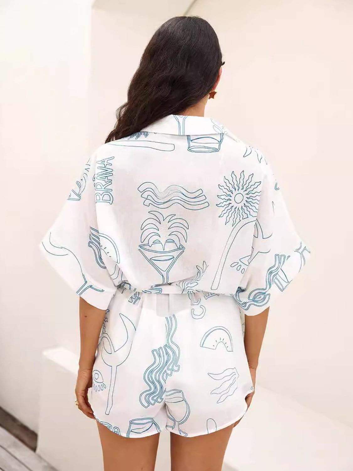 Printed Collared Neck Half Sleeve Romper.