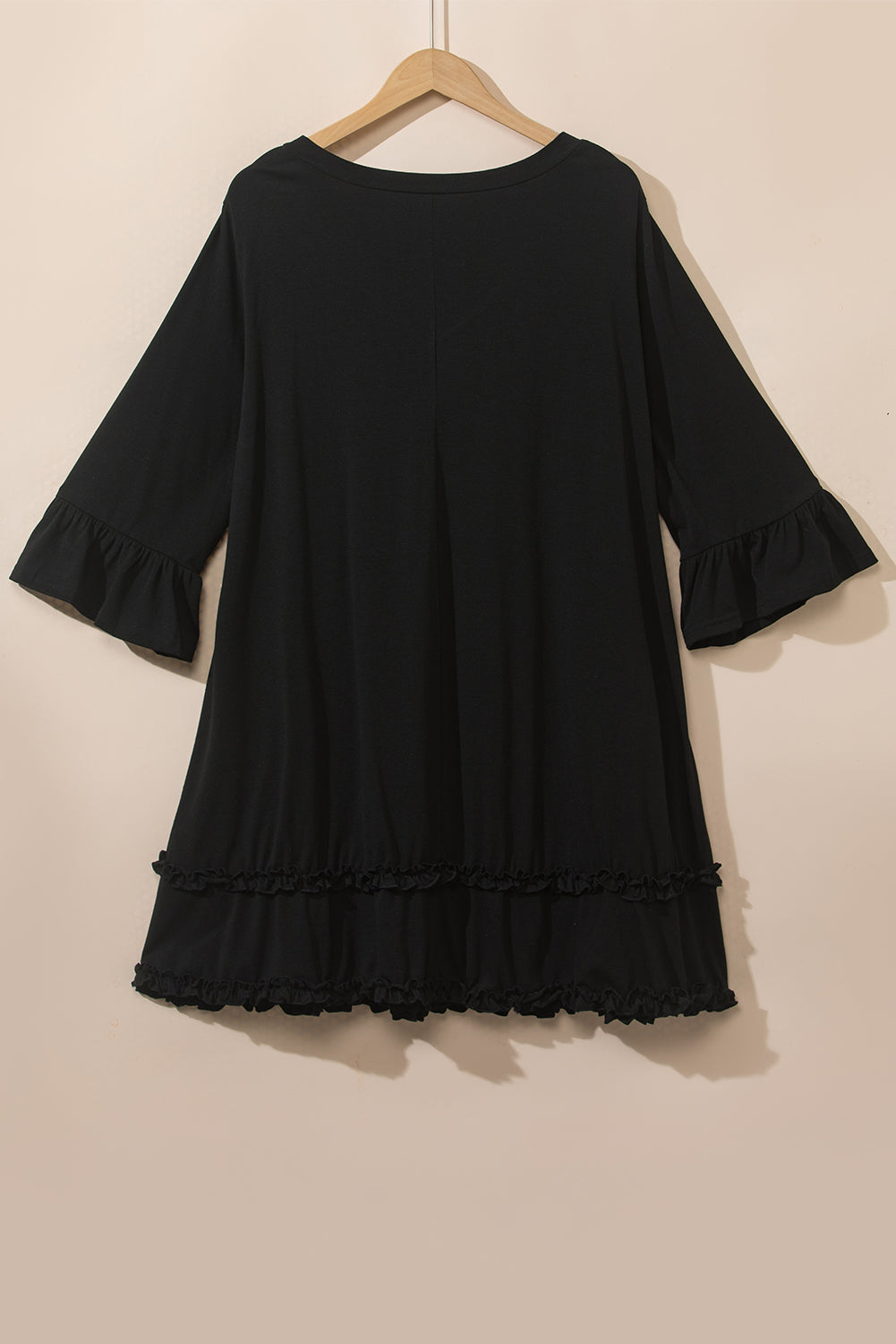 Chic black plus size ruffled sleeve dress for effortless elegance