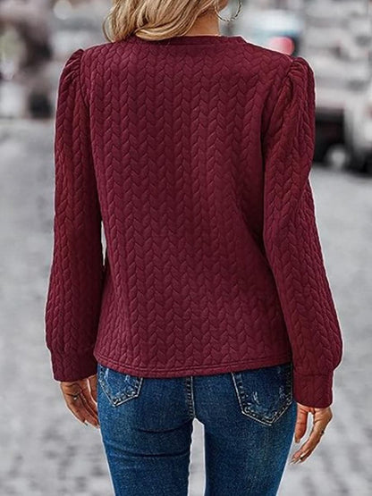 Textured Round Neck Long Sleeve Sweatshirt.