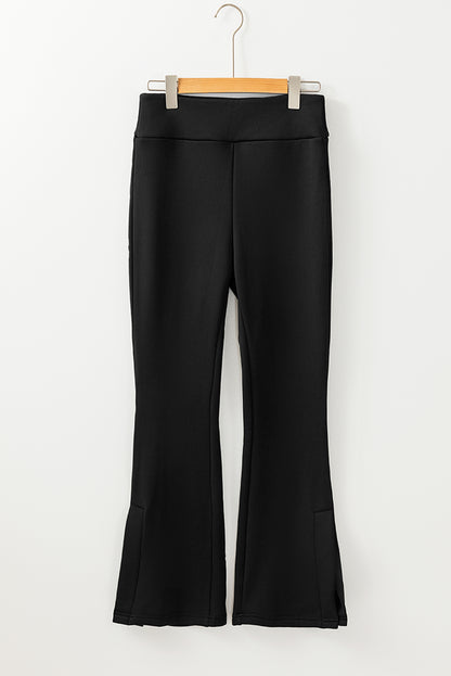 Cozy black thermal flare leg pants with stylish slits