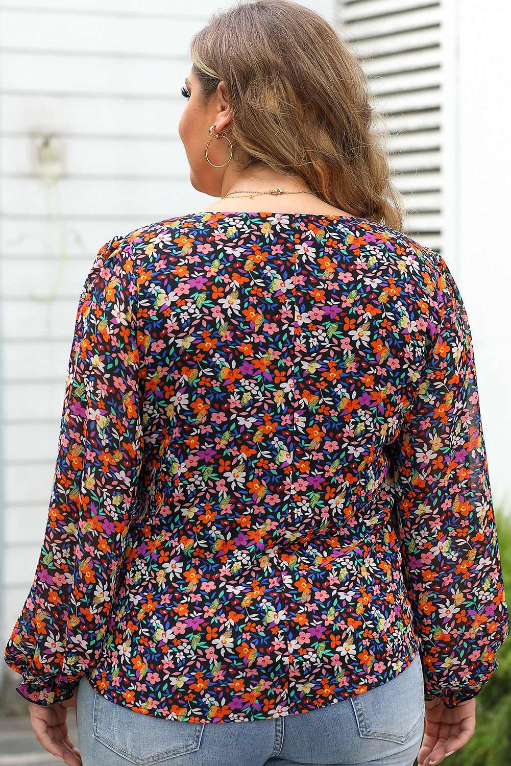 Chic black plus size floral blouse with v neck and bubble sleeves