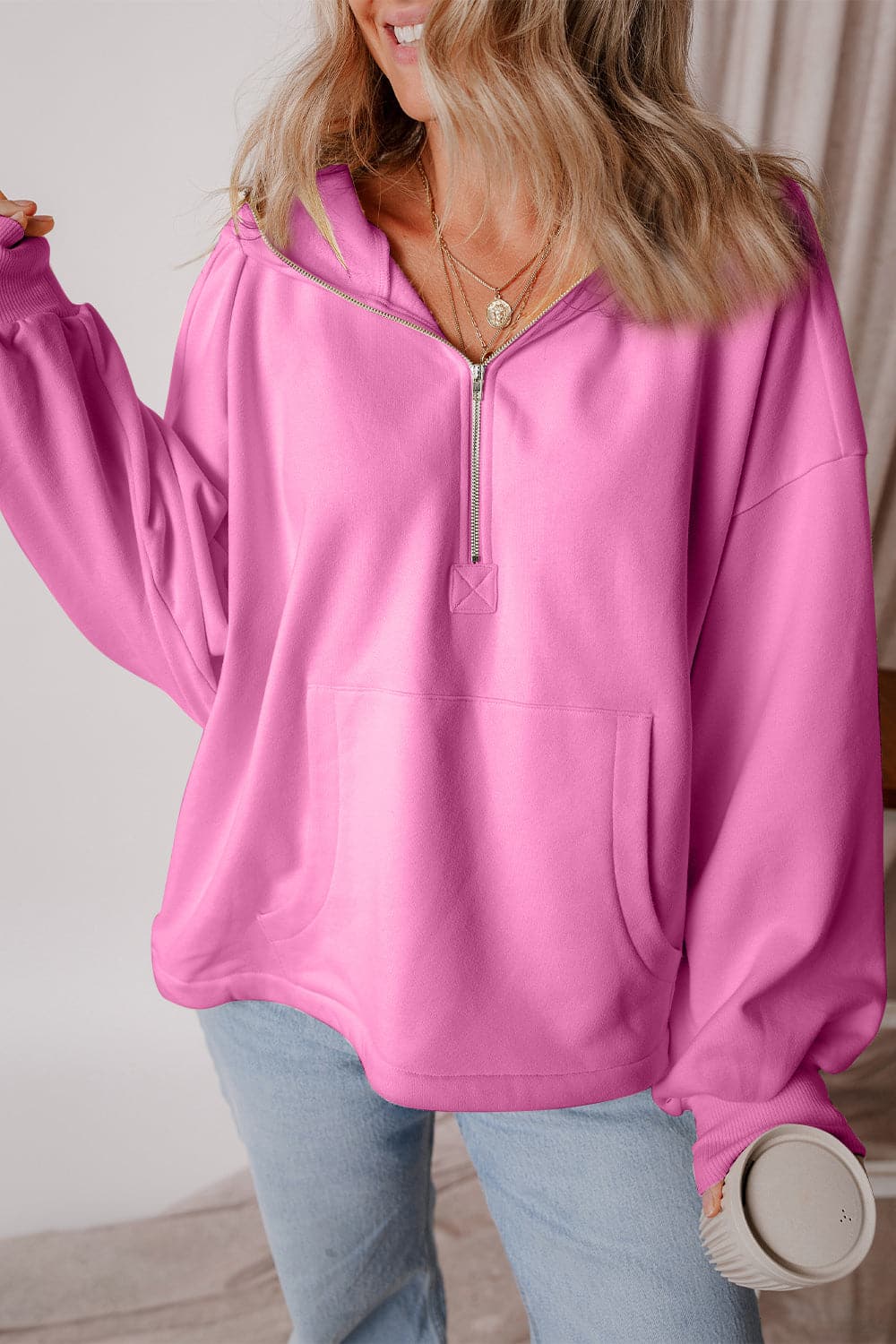 Pocketed Half Zip Dropped Shoulder Hoodie.