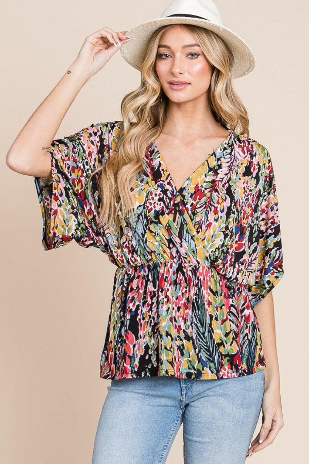 BOMBOM Printed Surplice Peplum Blouse.