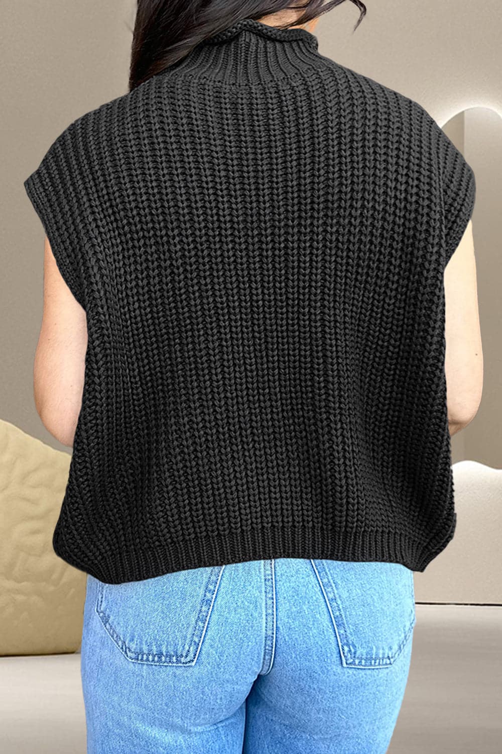 Cable-Knit Mock Neck Cap Sleeve Sweater.