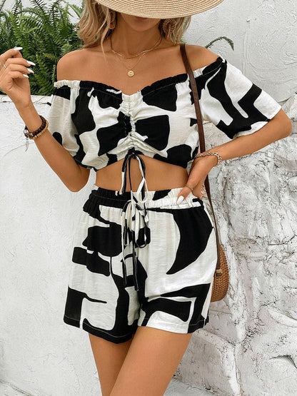 Drawstring Off-Shoulder Top and Shorts SetDrawstring Off-Shoulder Top and Shorts Set
 Discover the perfect blend of comfort and style with our Drawstring Off-Shoulder Top and Shorts Set.
 Features:
 
 
Tied,Love Salve -Shoulder Topjust arrived