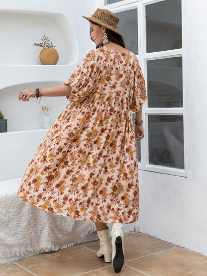 Plus Size Printed Tie Neck Half Sleeve Midi Dress.