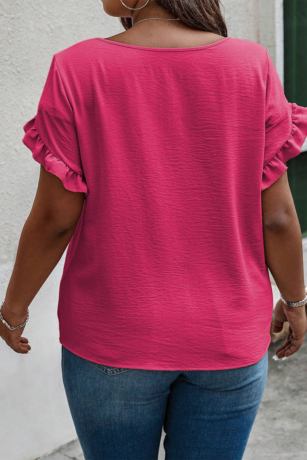 Playful pink ruffled short sleeve top for plus sizes