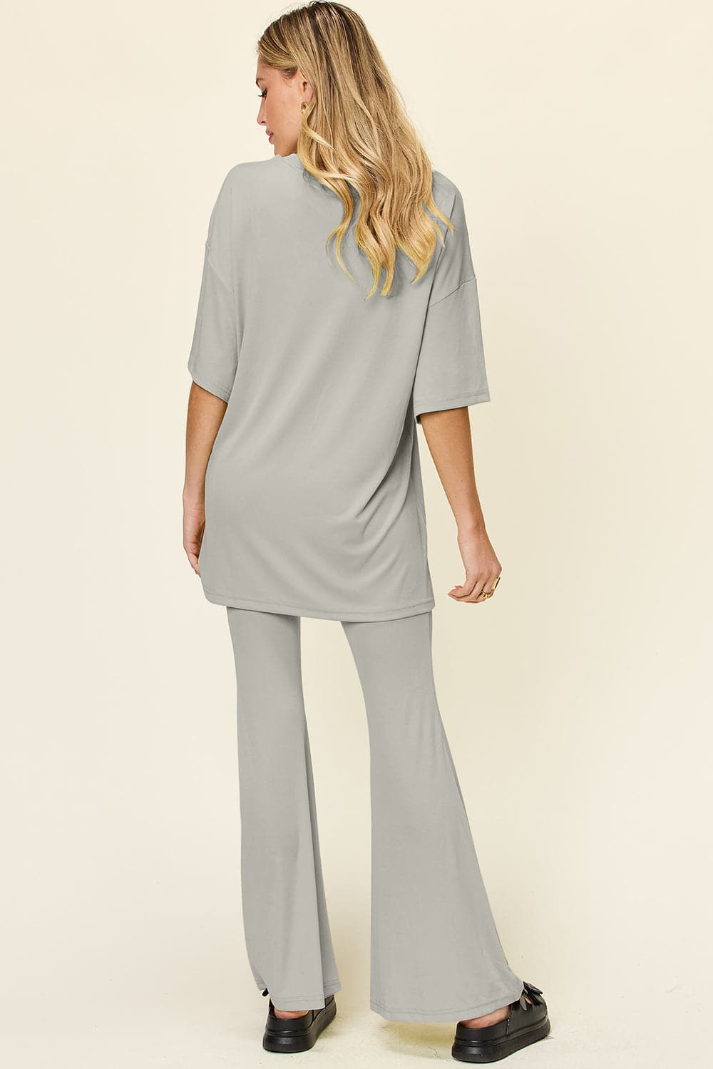 Double Take Full Size Round Neck Drop Shoulder T-Shirt and Flare Pants Set.